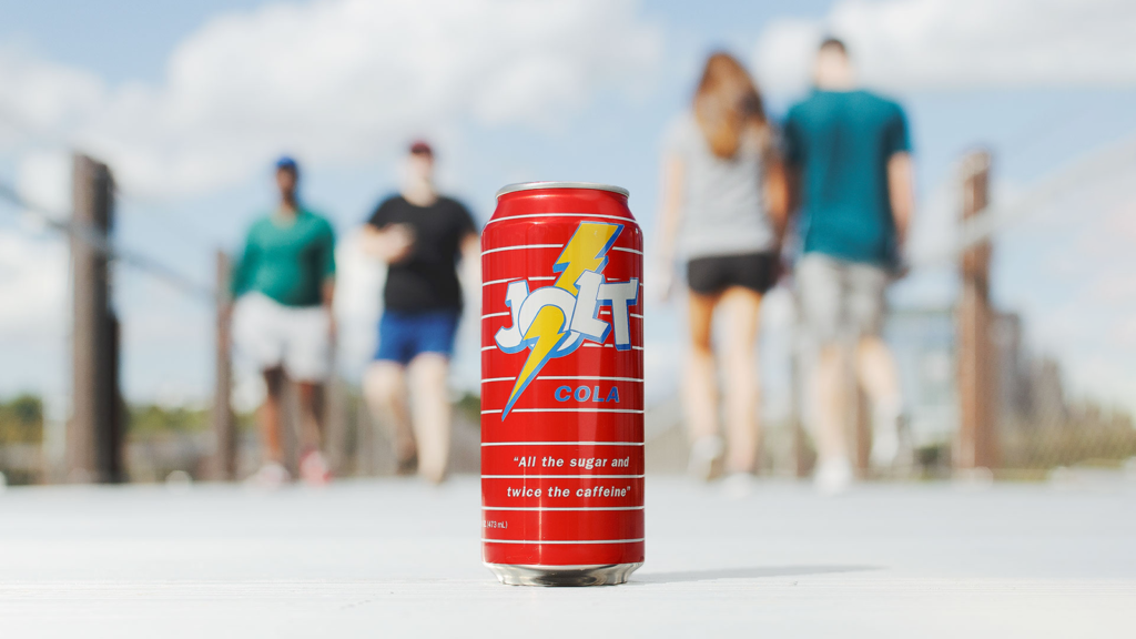 A Jolt Cola can placed on a walking bridge