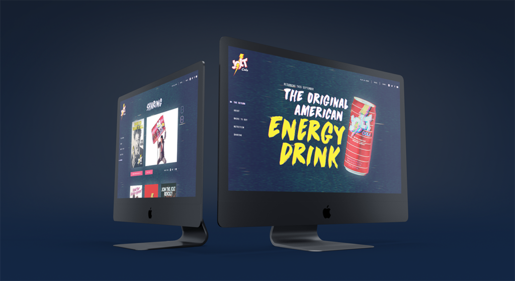 Two Jolt Cola webpages featured on two different Mac monitors