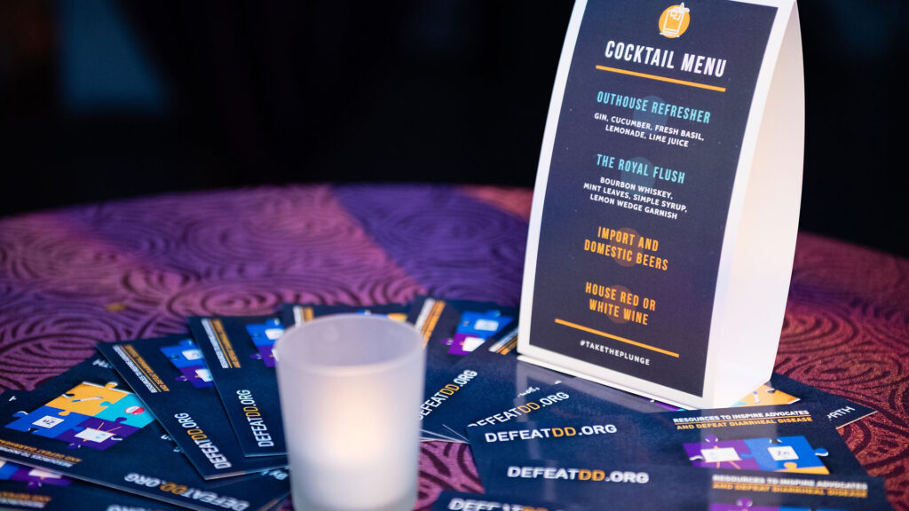 A closeup of the cocktail menu at the Defeat DD, Take the Plunge event