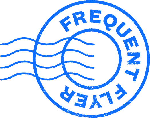 A blue circular stamp with wavy lines on the left and the words "FREQUENT FLYER" written around the inside edge.