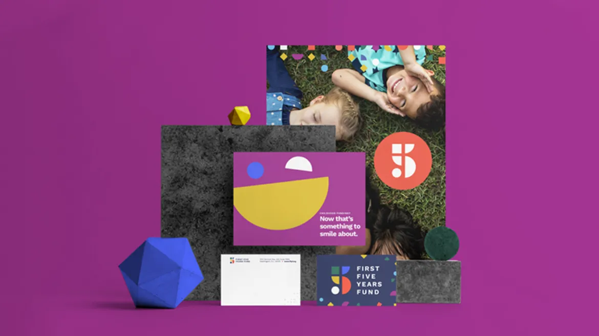 A vibrant display on a purple background showing various First Five Years Fund promotional items: a brochure with a smiley face graphic, an image of children lying on the grass smiling, geometric shapes, and a business card with the fund's logo.