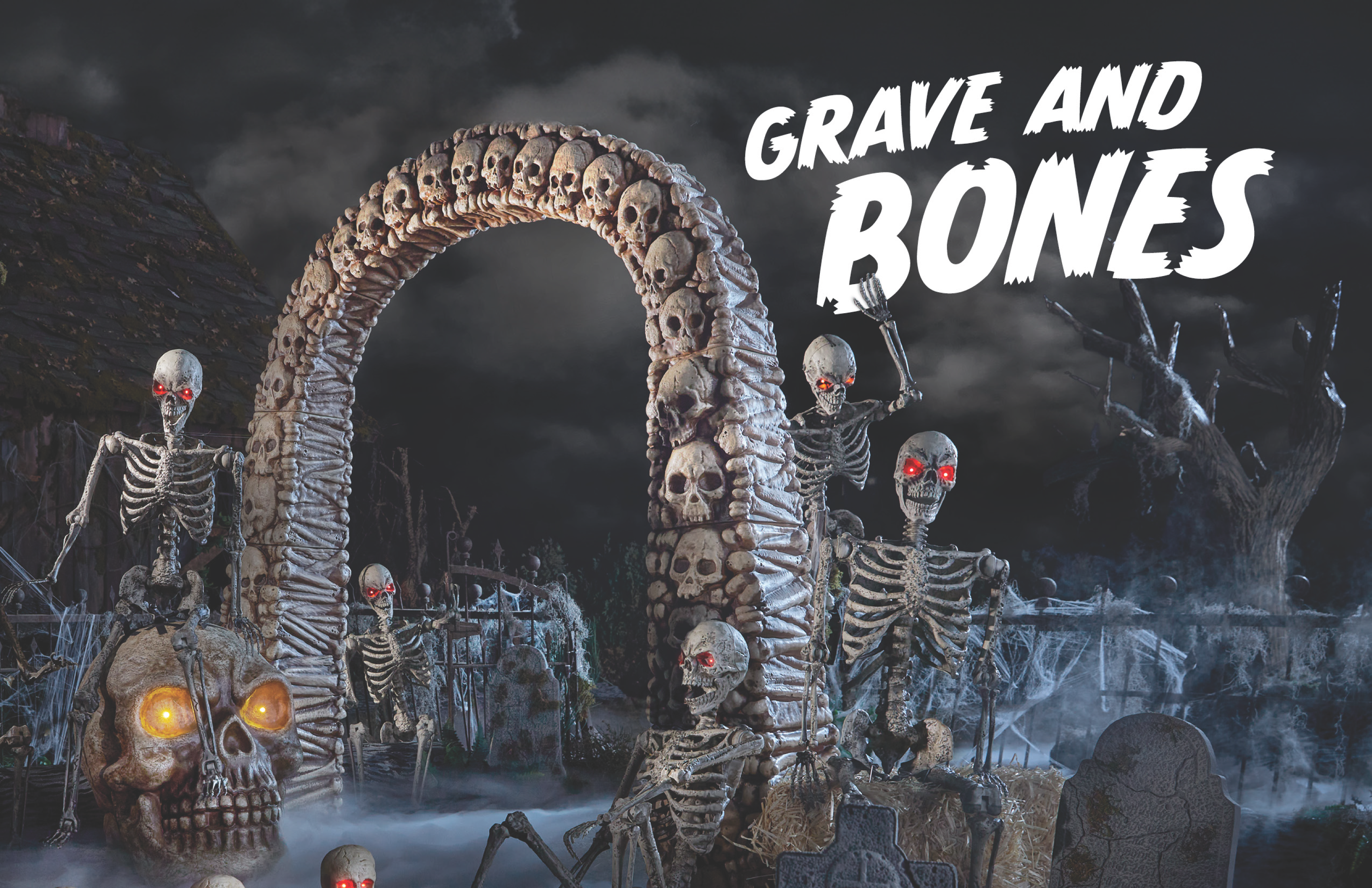 A foggy, eerie graveyard scene with skeletons and skulls. A large archway made of skulls dominates the center. Red-eyed skeletons stand around. The text "Grave and Bones" is prominently displayed at the top right.